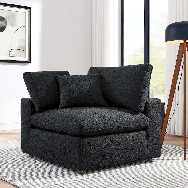 Fauteuil d'angle en tissu bouclé surrembourré, garni de duvet Commix