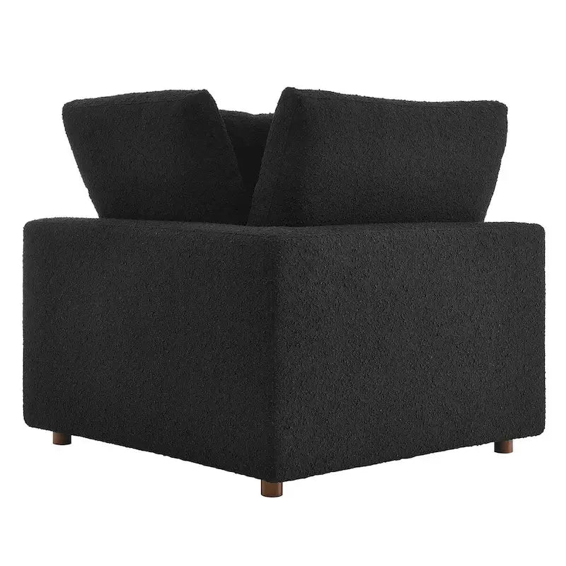 Fauteuil d'angle en tissu bouclé surrembourré, garni de duvet Commix