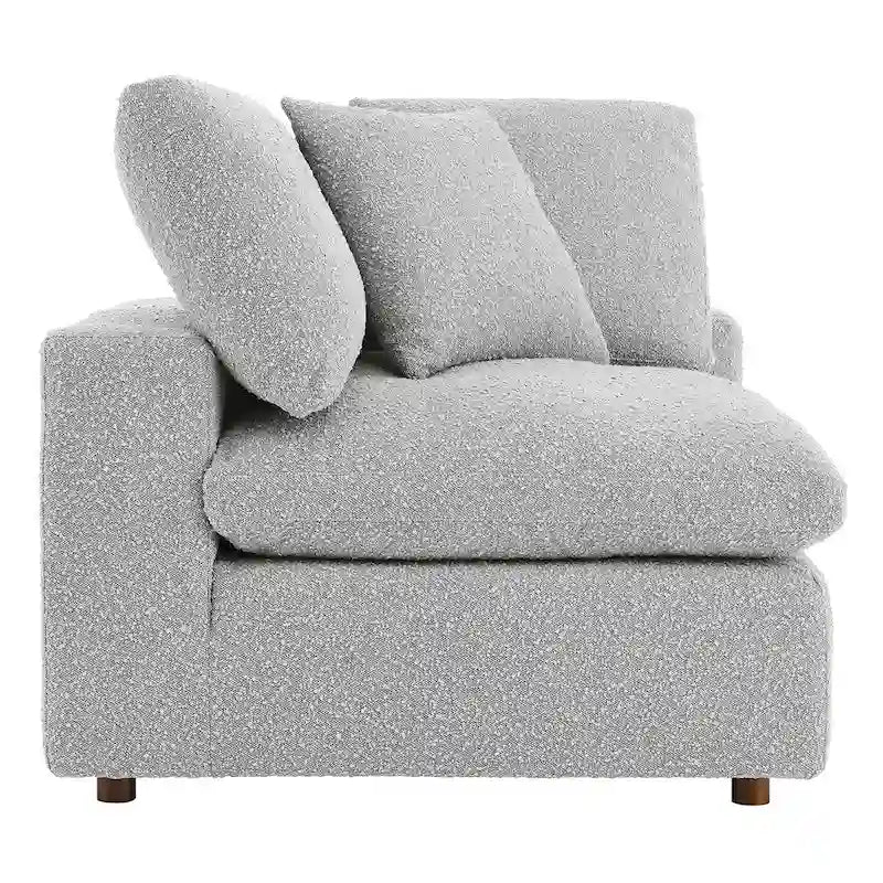 Fauteuil d'angle en tissu bouclé surrembourré, garni de duvet Commix