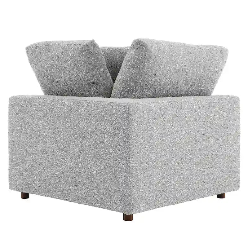 Fauteuil d'angle en tissu bouclé surrembourré, garni de duvet Commix