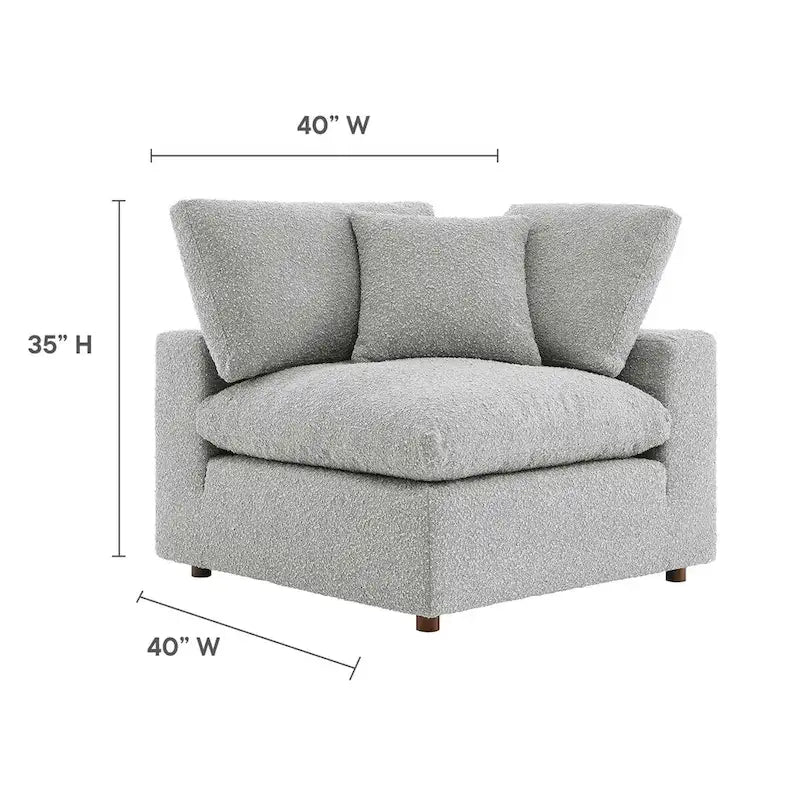 Fauteuil d'angle en tissu bouclé surrembourré, garni de duvet Commix