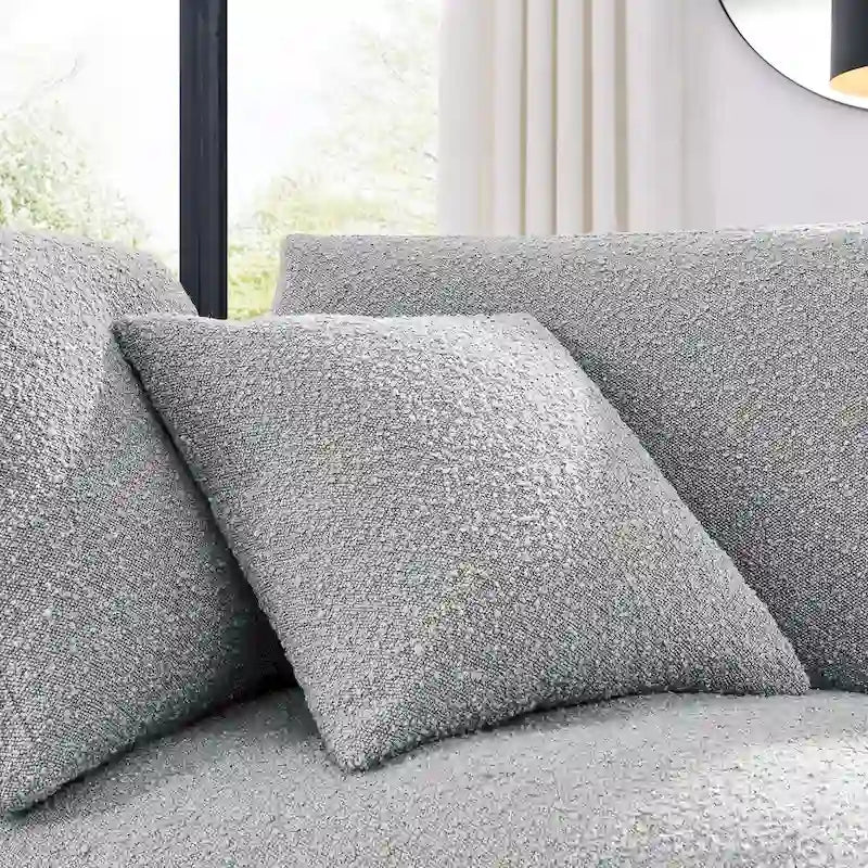 Fauteuil d'angle en tissu bouclé surrembourré, garni de duvet Commix